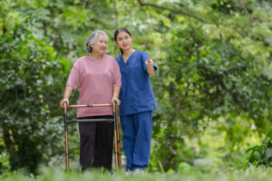 elderly woman with walker receives guidance from y 2024 12 07 23 20 45 utc